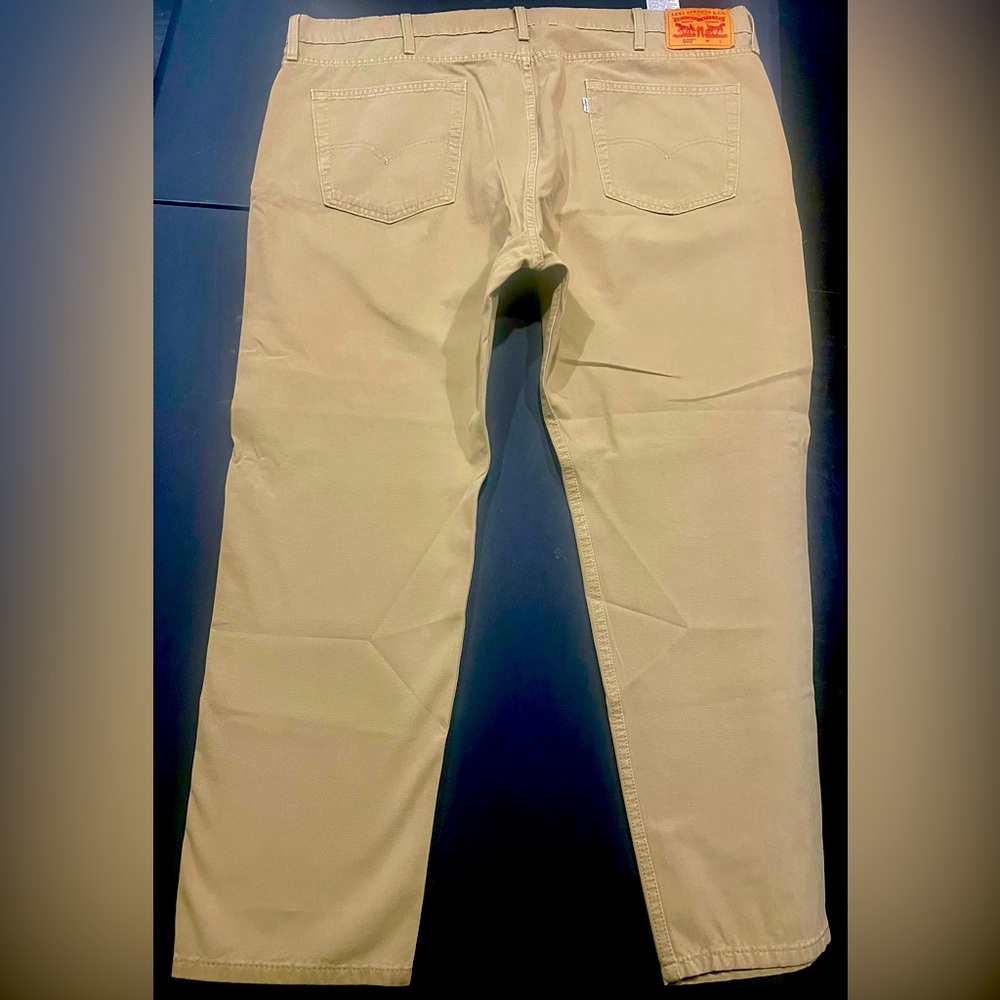 Brand New. Tan,502 Levis Denim. Size 44w/30L.